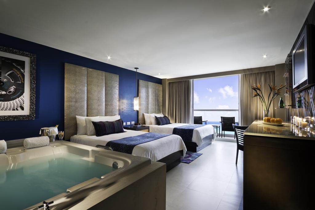 Habitación familiar Deluxe clásica con 2 camas y vistas al mar